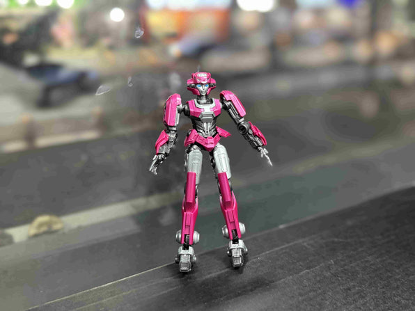 mentioned ariel head Character from cybertron Elite one standing counterpart of optimus prime, arcee